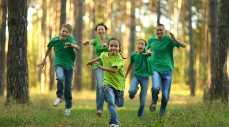 Family running in the woods